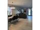Open concept dining room and living room area at 626 Baldwin Dr, Kissimmee, FL 34758