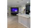 Modern kitchen with two-toned cabinets, a large island, and stainless steel appliances at 626 Baldwin Dr, Kissimmee, FL 34758