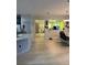 Kitchen with an island and view into the dining area at 626 Baldwin Dr, Kissimmee, FL 34758