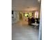 Living room with view of kitchen and dining area at 626 Baldwin Dr, Kissimmee, FL 34758