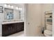 Bathroom with double sinks and toilet at 6364 Domenico Ct, Groveland, FL 34736