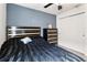 Bedroom with queen bed, double door closet, and ceiling fan at 6364 Domenico Ct, Groveland, FL 34736