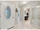 Interior entryway view, showing access to bathroom and other rooms at 6364 Domenico Ct, Groveland, FL 34736