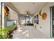 Relaxing screened porch with rocking chairs at 6364 Domenico Ct, Groveland, FL 34736