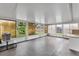 Large sunroom with multiple windows providing plenty of natural light and views of the yard at 7933 Merrimac Cove Dr, Orlando, FL 32822