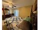 Guest bedroom with post bed and dresser at 813 Halifax Dr, Kissimmee, FL 34758