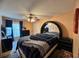 Spacious bedroom with large bed and ample closet space at 813 Halifax Dr, Kissimmee, FL 34758