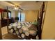 Guest bedroom with post bed and ample closet space at 813 Halifax Dr, Kissimmee, FL 34758