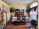 Formal dining room with a large table and china cabinet at 813 Halifax Dr, Kissimmee, FL 34758