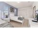Comfortable bedroom features a bed, closet, and a TV at 947 Emerald Green Ct, Kissimmee, FL 34746