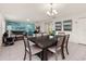 Spacious dining area connects to the living room, offering seamless entertaining possibilities at 947 Emerald Green Ct, Kissimmee, FL 34746