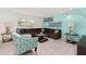Comfortable living room with a brown sectional sofa, patterned chair, and stylish decor at 947 Emerald Green Ct, Kissimmee, FL 34746