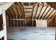 Unfinished attic under construction with exposed wood beams and flooring at 0 Orangewood Ave, St Cloud, FL 34772