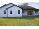 Exterior elevation of a home, showing back of house and an open porch at 0 Orangewood Ave, St Cloud, FL 34772