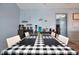 Dining room with table, chairs, bar area, and modern décor at 113 Kenny Blvd, Haines City, FL 33844