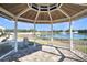 Interior of gazebo overlooking pond and water feature at 113 Kenny Blvd, Haines City, FL 33844