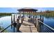 Scenic waterfront gazebo offering serene views, perfect for relaxation and enjoying the natural surroundings at 113 Kenny Blvd, Haines City, FL 33844