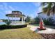 View of the gazebo and fountain near lake, showcasing community amenities at 113 Kenny Blvd, Haines City, FL 33844