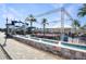 Shot of the community water park featuring slides, seating and a covered stage at 113 Kenny Blvd, Haines City, FL 33844