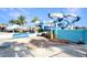 Community water park with a thrilling water slide, perfect for Gathering fun and recreation on a sunny day at 113 Kenny Blvd, Haines City, FL 33844