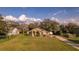 Inviting single-story home with well-maintained lawn, lovely landscaping, and a neutral color scheme at 1145 Sugar Belt Dr, St Cloud, FL 34771