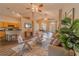 Spacious living area showcasing hardwood floors, open layout, dining area, and bright natural light at 1145 Sugar Belt Dr, St Cloud, FL 34771