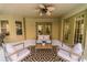 Outdoor patio area perfect for relaxation and entertaining, includes comfortable seating and stylish decor at 1145 Sugar Belt Dr, St Cloud, FL 34771
