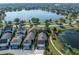 Gorgeous aerial view of the home on a waterfront with scenic walking path and surrounding community at 13432 Beebe Aly, Orlando, FL 32827