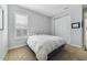 Bedroom featuring carpeted flooring, a window with blinds, and a double door closet at 13432 Beebe Aly, Orlando, FL 32827