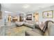 Open concept living room and dining area with stylish furniture and modern decor at 13432 Beebe Aly, Orlando, FL 32827