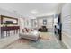 Bright living room with modern furniture, a decorative fireplace, and large windows with plantation shutters at 13432 Beebe Aly, Orlando, FL 32827