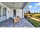 Inviting outdoor patio has brick pavers, serene views, and an idyllic space to relax and unwind at 13432 Beebe Aly, Orlando, FL 32827