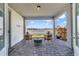 Covered patio featuring outdoor seating and a view of the lake at 13432 Beebe Aly, Orlando, FL 32827