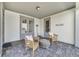 Charming covered patio featuring brick pavers and a cozy seating area, perfect for outdoor enjoyment at 13432 Beebe Aly, Orlando, FL 32827