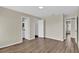 Spacious bedroom features neutral walls and wood flooring at 1410 Rena Ln, Kissimmee, FL 34744