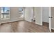This bright bedroom has new wood flooring and a pretty lake view at 1410 Rena Ln, Kissimmee, FL 34744