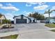 Charming one-story home with a spacious driveway and an attached two-car garage at 1410 Rena Ln, Kissimmee, FL 34744