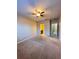 Spacious bedroom featuring carpet, a ceiling fan and doorways to the bathroom and hallway at 14257 Desert Haven St # Ge, Windermere, FL 34786