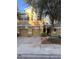Inviting townhome showcasing a neatly manicured front yard with a two-car garage and charming architectural details at 14257 Desert Haven St # Ge, Windermere, FL 34786
