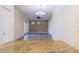 The dining area features an elegant chandelier, decorative wall and bright windows at 14637 Tanja King Blvd, Orlando, FL 32828