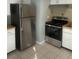 Well-lit kitchen featuring stainless steel appliances, and butcher block countertops at 1507 Georgia Ave, St Cloud, FL 34769