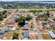 Scenic aerial view of a quiet neighborhood with green spaces and residential homes at 152 Harrison St, Lake Wales, FL 33859