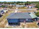 Aerial view showing the sunroom, shed, and home's layout at 152 Harrison St, Lake Wales, FL 33859