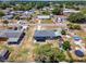 Birds eye view of the property with a sunroom and backyard storage sheds at 152 Harrison St, Lake Wales, FL 33859