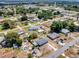 Wide aerial view of a residential neighborhood with mature trees and single-Gathering homes at 152 Harrison St, Lake Wales, FL 33859