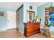 Bedroom featuring sliding barn door, dresser and Star Wars themed decorations at 152 Harrison St, Lake Wales, FL 33859