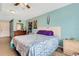 Bedroom with a sliding barn door and neutral-toned furnishings at 152 Harrison St, Lake Wales, FL 33859