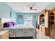 Comfortable bedroom with ample natural light and wood-look floors at 152 Harrison St, Lake Wales, FL 33859