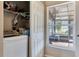 Practical laundry room with washer, dryer, and extra storage space at 152 Harrison St, Lake Wales, FL 33859
