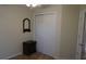 View of a bedroom with bi-fold doors on the closet and tile flooring at 156 Grand Canal Dr, Poinciana, FL 34759